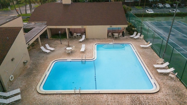 view of swimming pool featuring a patio