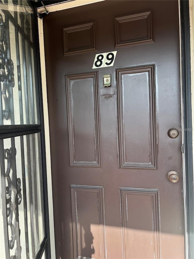 doorway to property with stucco siding