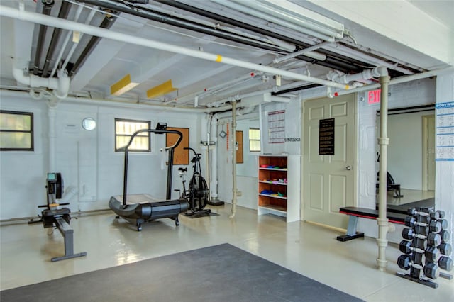 exercise room with concrete floors