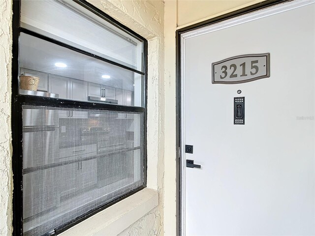 doorway to property featuring a balcony