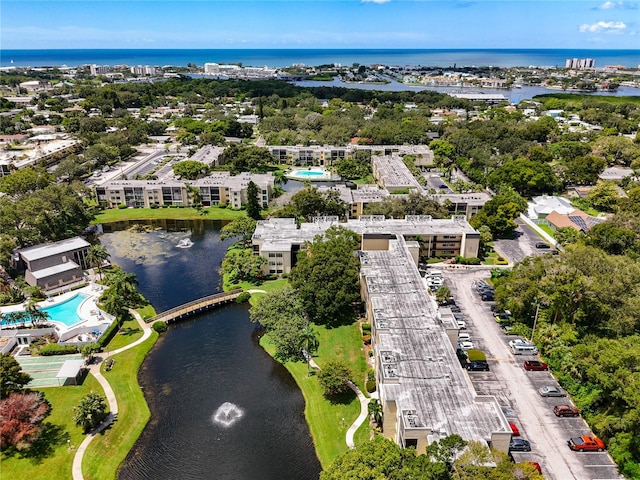 drone / aerial view with a water view