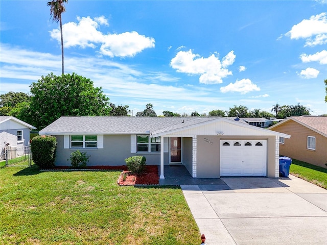 ranch-style house featuring a garage, driveway, a front lawn, and stucco siding