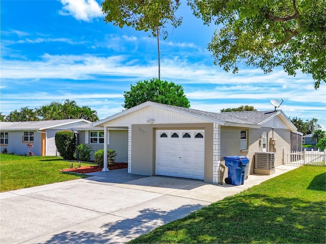 ranch-style home featuring a garage, concrete driveway, a front lawn, and fence