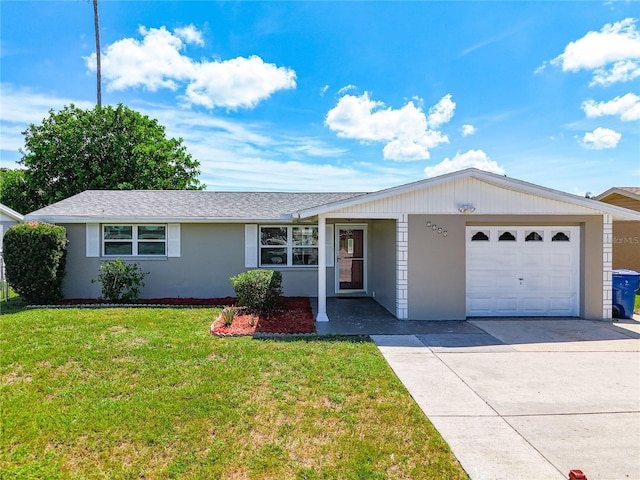 single story home featuring a garage and a front lawn