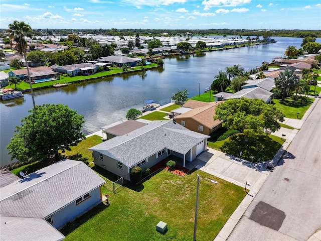 bird's eye view with a water view