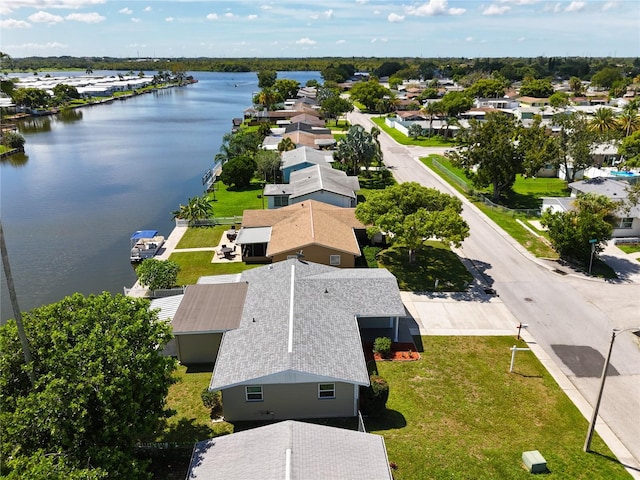 bird's eye view with a water view