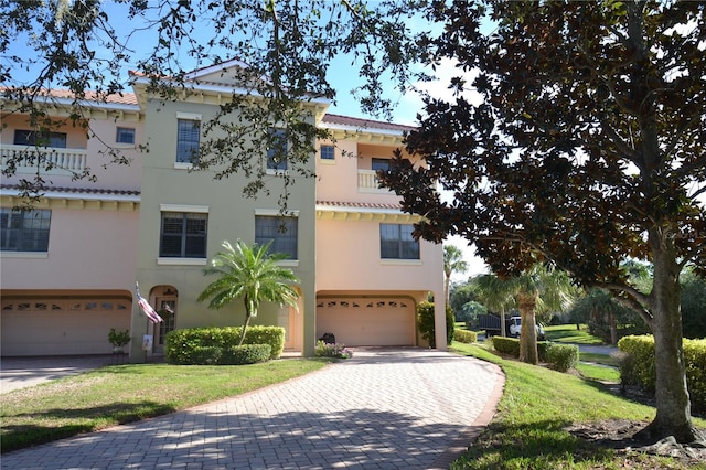 view of front of home with a garage