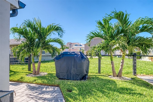 view of yard featuring a patio and fence