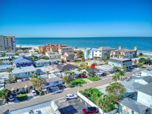 bird's eye view featuring a water view and a residential view