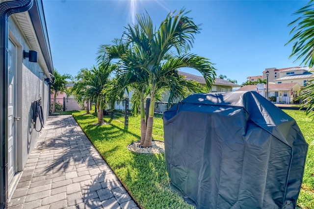 exterior space featuring a patio area and fence