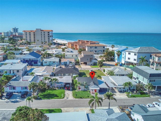 aerial view featuring a residential view and a water view