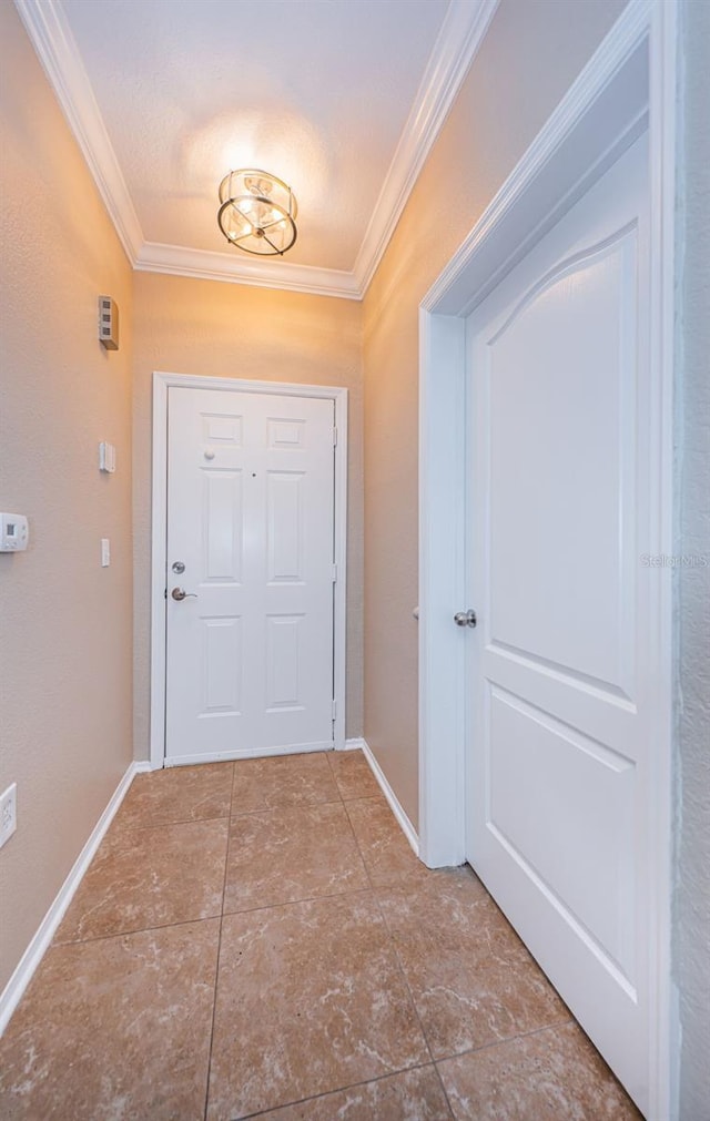 doorway featuring ornamental molding