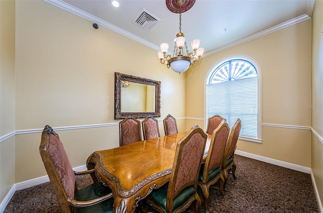 carpeted dining area featuring crown molding and an inviting chandelier