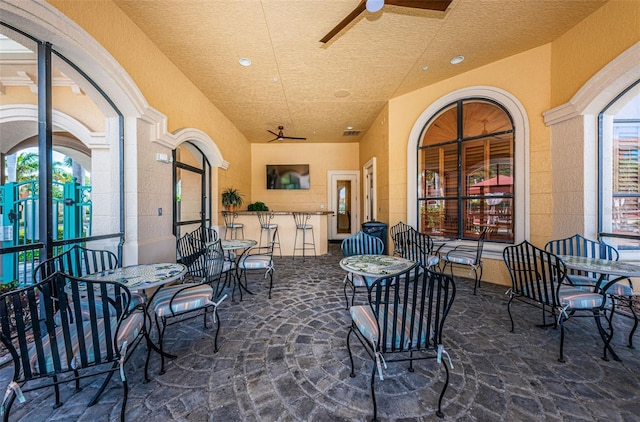 view of patio / terrace with ceiling fan