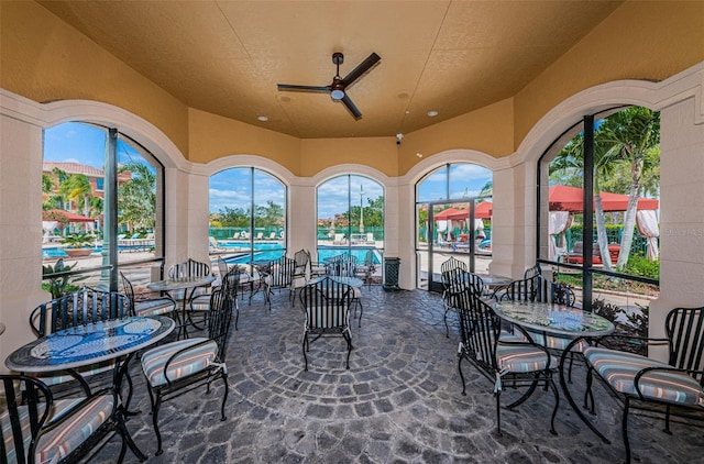 view of patio / terrace featuring ceiling fan