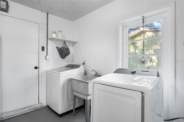 laundry area with washer and dryer