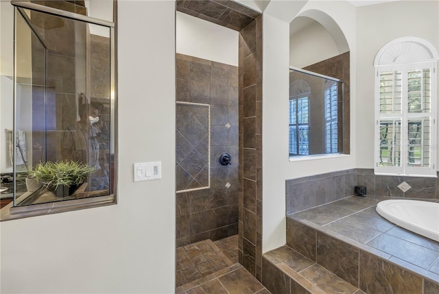 bathroom with independent shower and bath