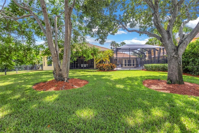 view of yard with a lanai