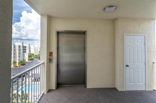 balcony featuring elevator