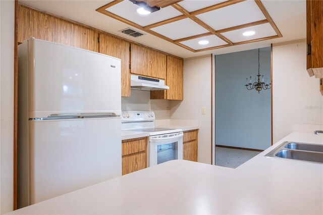 kitchen with white appliances and sink