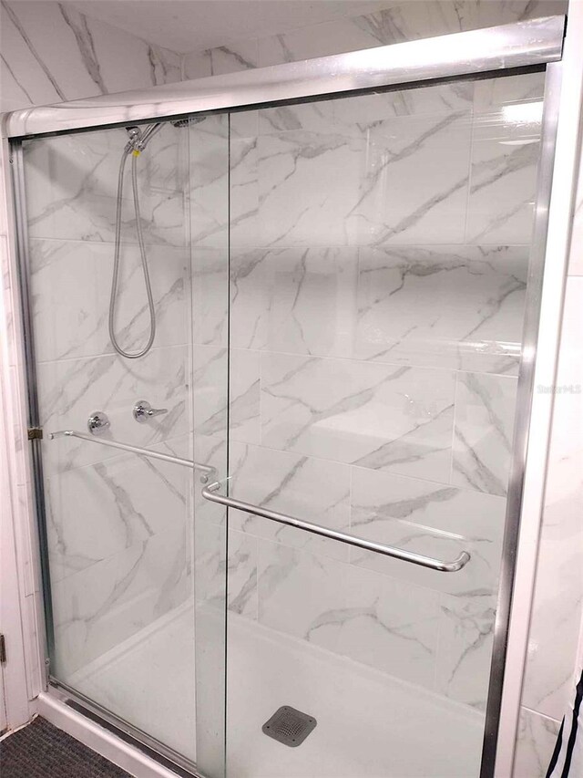 bathroom with an enclosed shower