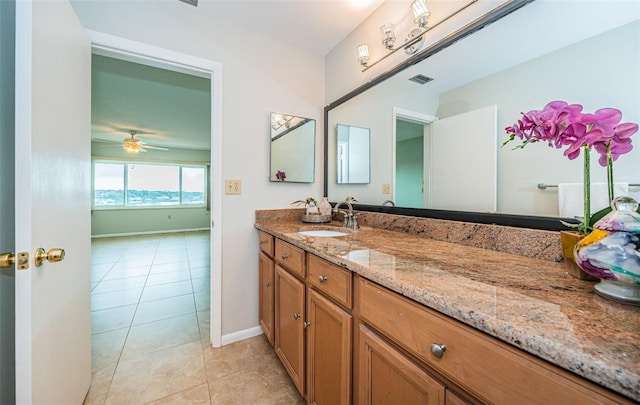 bathroom with vanity, tile patterned floors, and ceiling fan