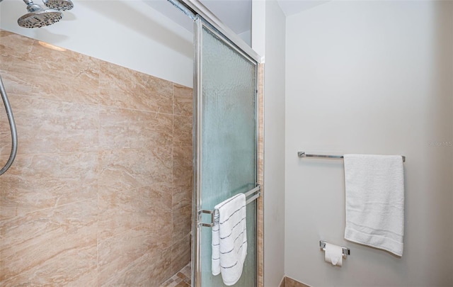 bathroom featuring an enclosed shower