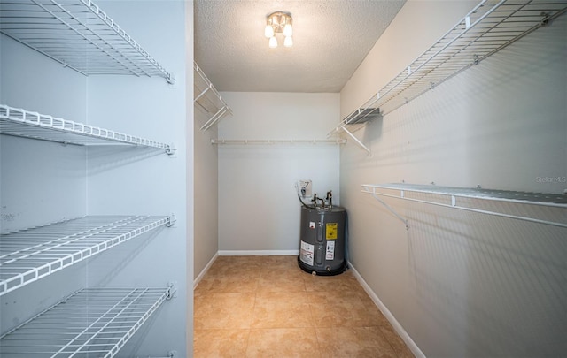 spacious closet with electric water heater