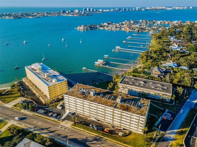 drone / aerial view featuring a water view and a city view