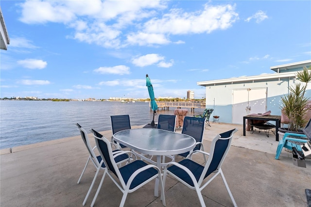 view of patio featuring a water view