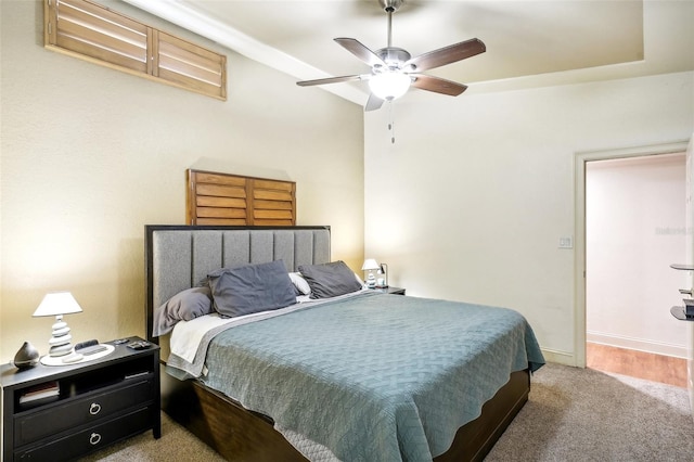 bedroom featuring a ceiling fan, carpet flooring, and baseboards