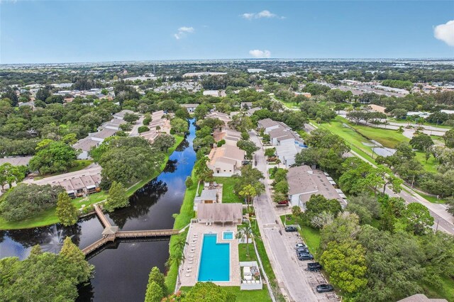 aerial view featuring a water view and a residential view