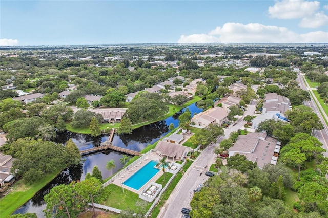 aerial view with a water view and a residential view