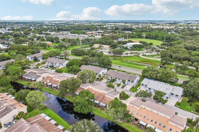 aerial view with a residential view and a water view