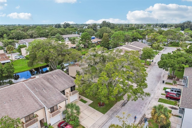 birds eye view of property featuring a residential view and a water view