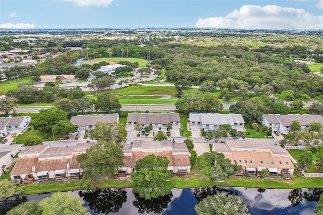 aerial view featuring a water view and a residential view