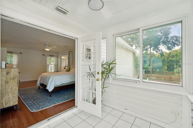 bedroom with ceiling fan and light hardwood / wood-style floors