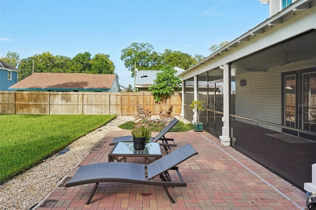 view of patio / terrace featuring a sunroom