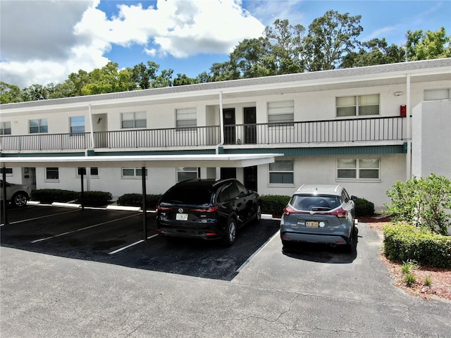 exterior space with covered parking