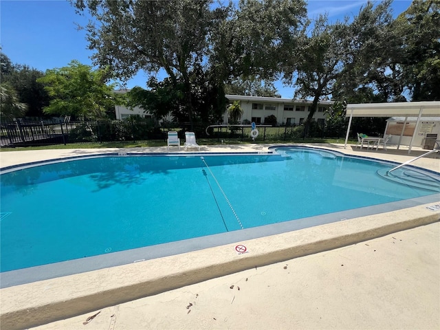 view of swimming pool featuring a patio