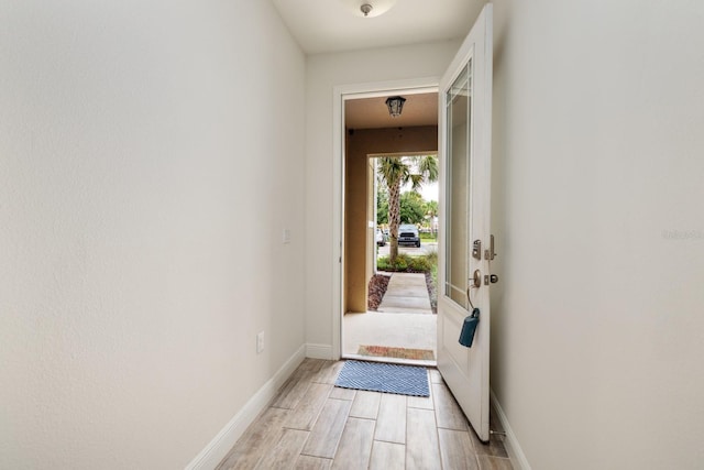 doorway featuring light wood-type flooring