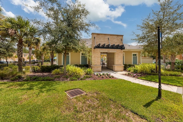 view of front of property with a front lawn