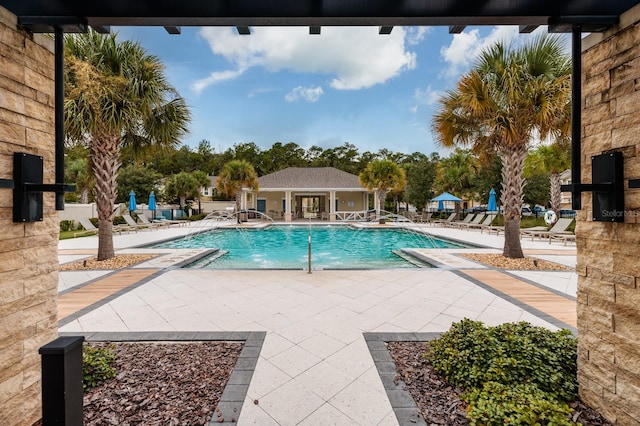 view of swimming pool featuring a patio area