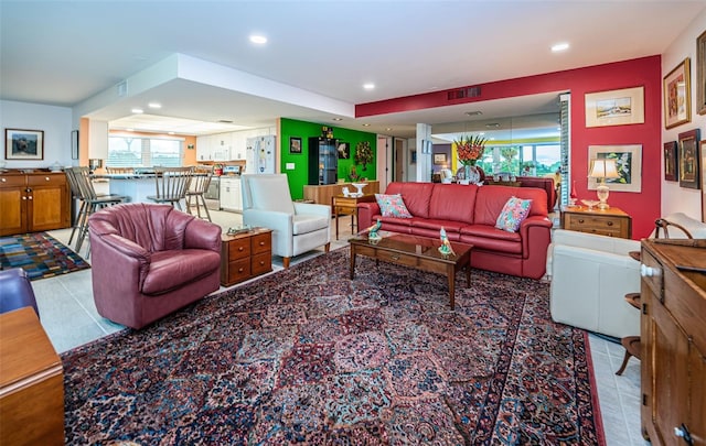 living room with light tile patterned floors