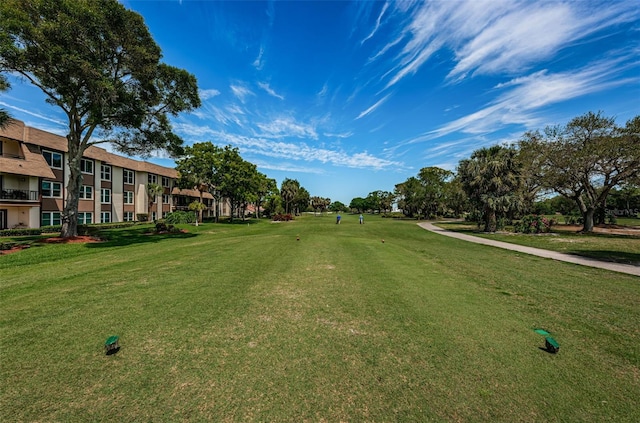 view of community featuring a yard