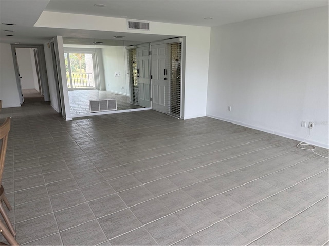 view of tiled spare room