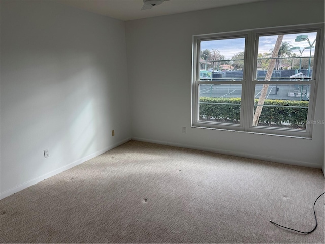 empty room featuring carpet floors