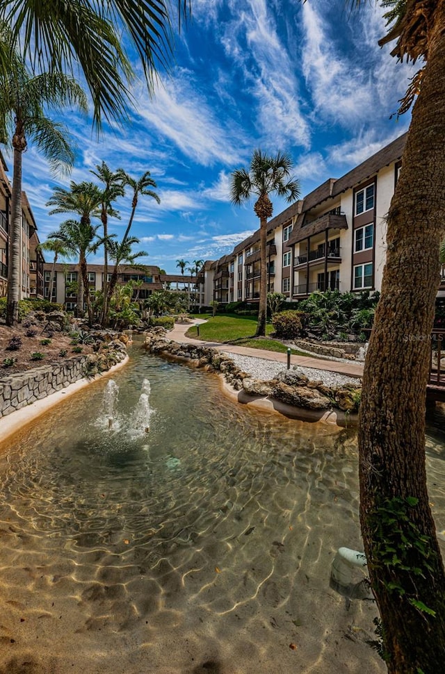 view of home's community featuring a water view