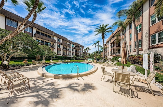 view of pool with a patio area