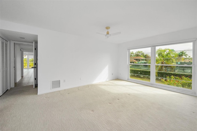 3021 Countryside Blvd Unit 28A, Clearwater, FL 33761 - carpeted spare room with ceiling fan
